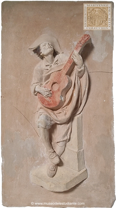 A spanish student playing guitar