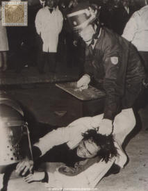 Anti-U.S. Riots flare in Japan. Tokyo policeman, with shield in right hand, grasps hair of a student during riot in the Japanese capital. Students demonstrated against the opening of a new U. S. Army hospital for wounded U. S. soldiers from Vietnam. A pitched battle raged for more than an hour between police and students who tried to storm into the military hospitals compound. Although Japan officially supports the U. S. stand in Vietnam, there have been frequent anti-U.S. demonstrations by students